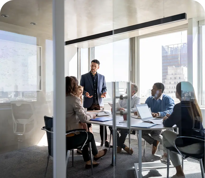 Professional group collaborating in office setting