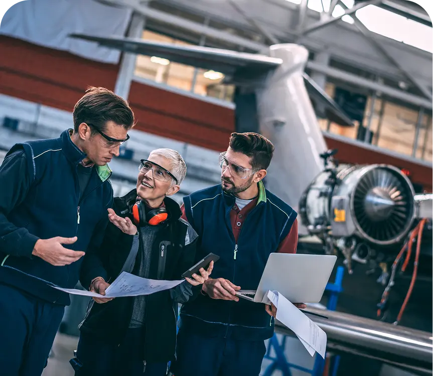 Team reviewing airplane specifications
